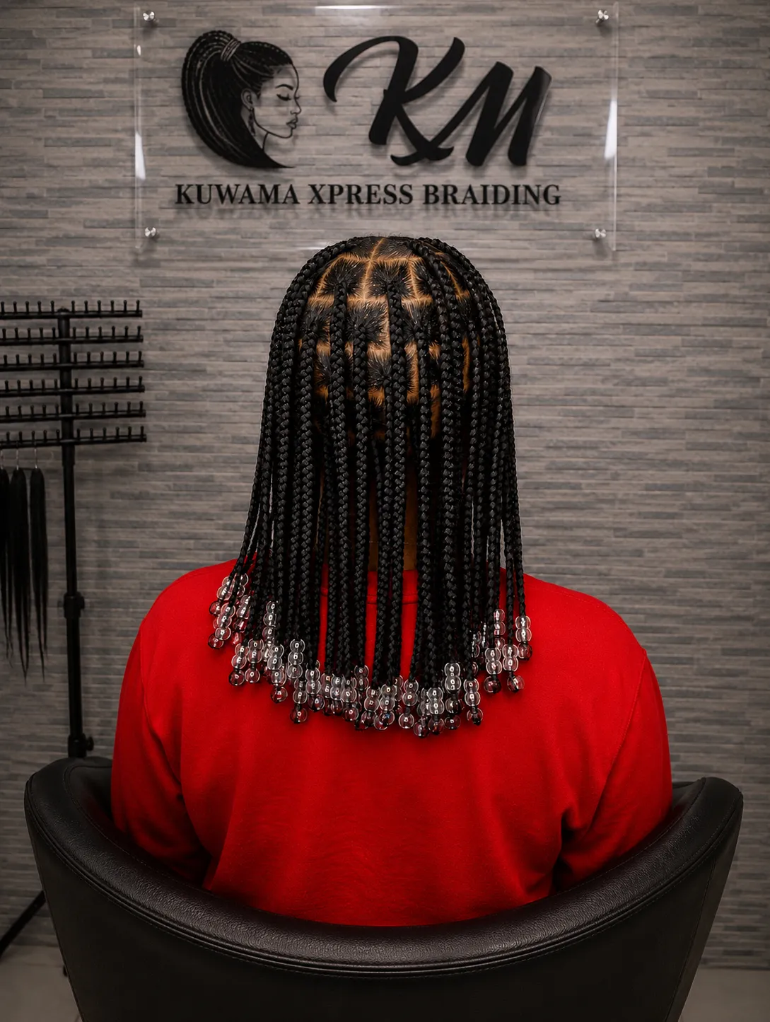 Curly-ended protective style in auburn tones